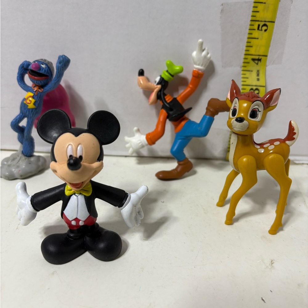 4 Disney Toy Figures; Mickey Mouse, Goofy, Bambi & Super Grover